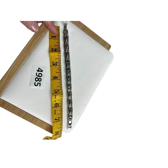 Silver linked bracket with blue tear drop crystal rhinestone accent - Picture 10 of 12